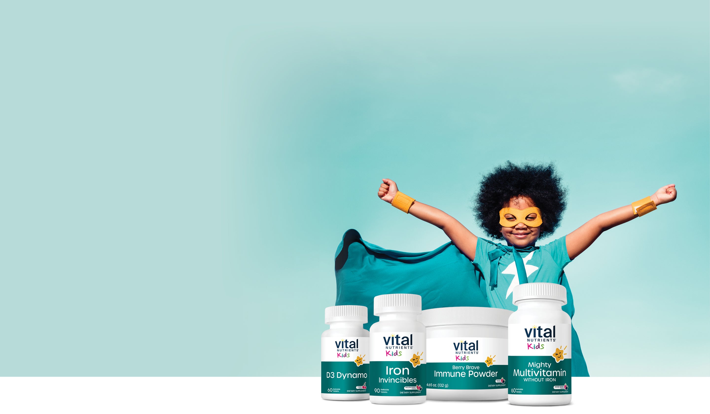 A child dressed as a superhero with a cape, with arms raised, next to Vital Nutrients Kids vitamins.